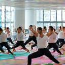Corporate team practicing yoga